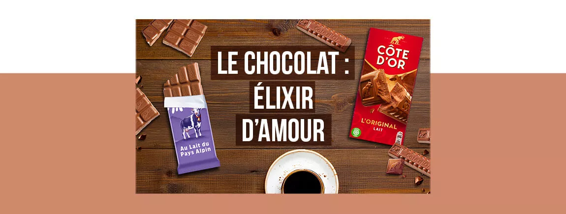 Tablettes de chocolat Milka et Côte d’Or avec une tasse de café.